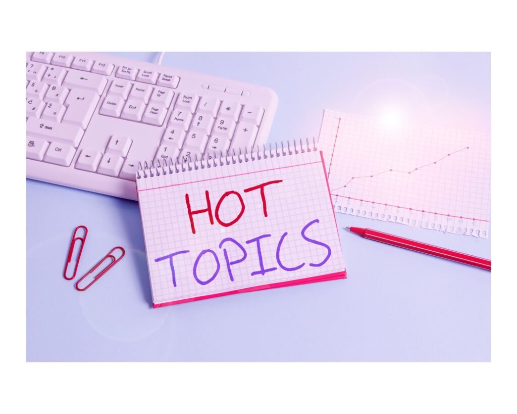Hot Topics Written On NotePade Concept
